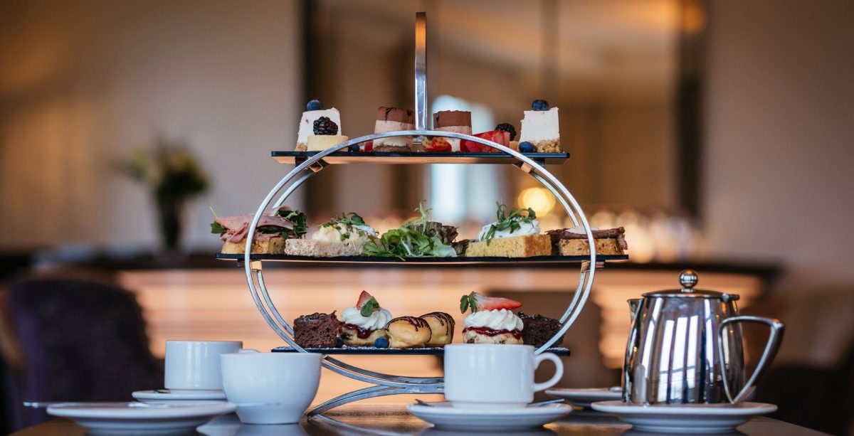 Pictured here is an afternoon tea stand which includes a mix of sweet and savoury treats. The galway bay hotels frequently runs packages and offers on afternoon tea